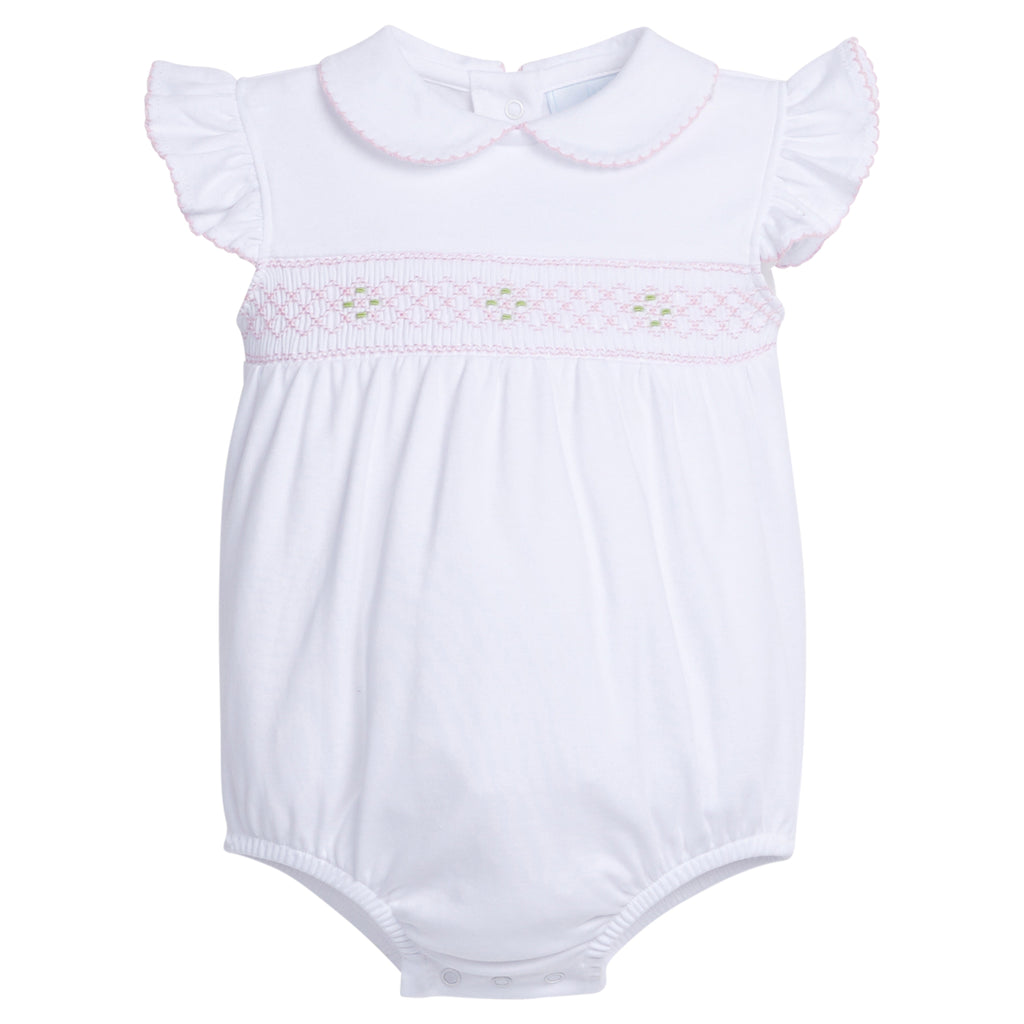 Little English traditional children's clothing. White peter pan bubble pink smocking for baby girls for spring