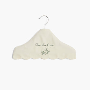 Children's Hanger in Ivory with a personalized monogram name on front.