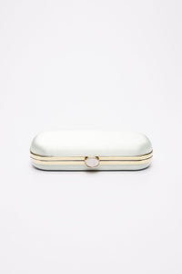 A white eyeglass case with a gold-toned clasp, centered on a plain background, reminiscent of the Bella Clutch Sage Green Satin Petitie from The Bella Rosa Collection.