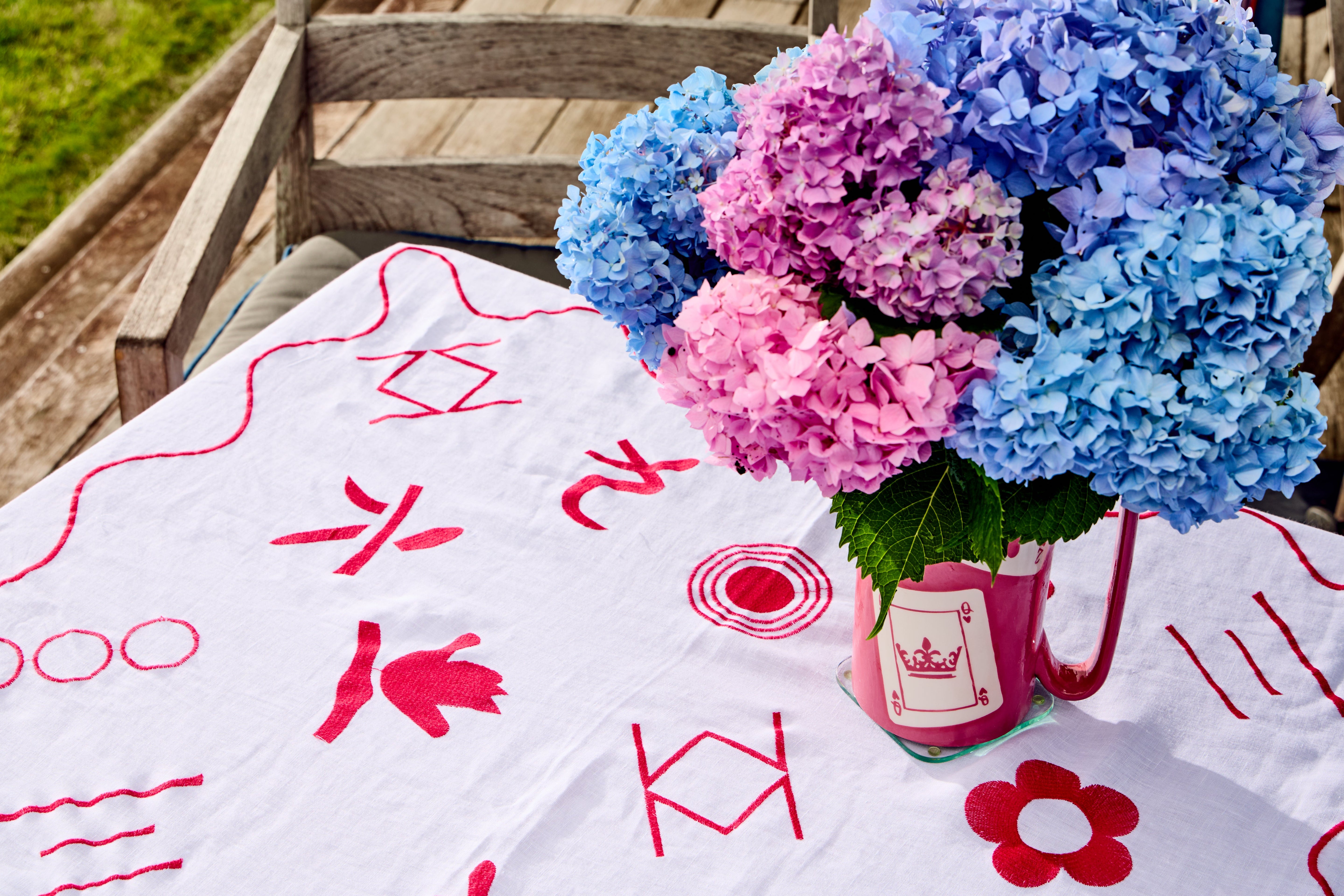 Close up detail of embroidery on Mahjong linen tablecloth
