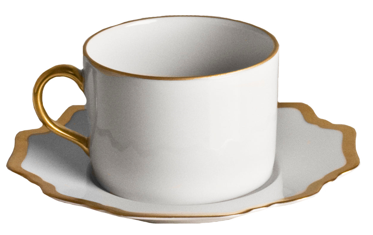 Antique White Tea Cup in Gold Rim