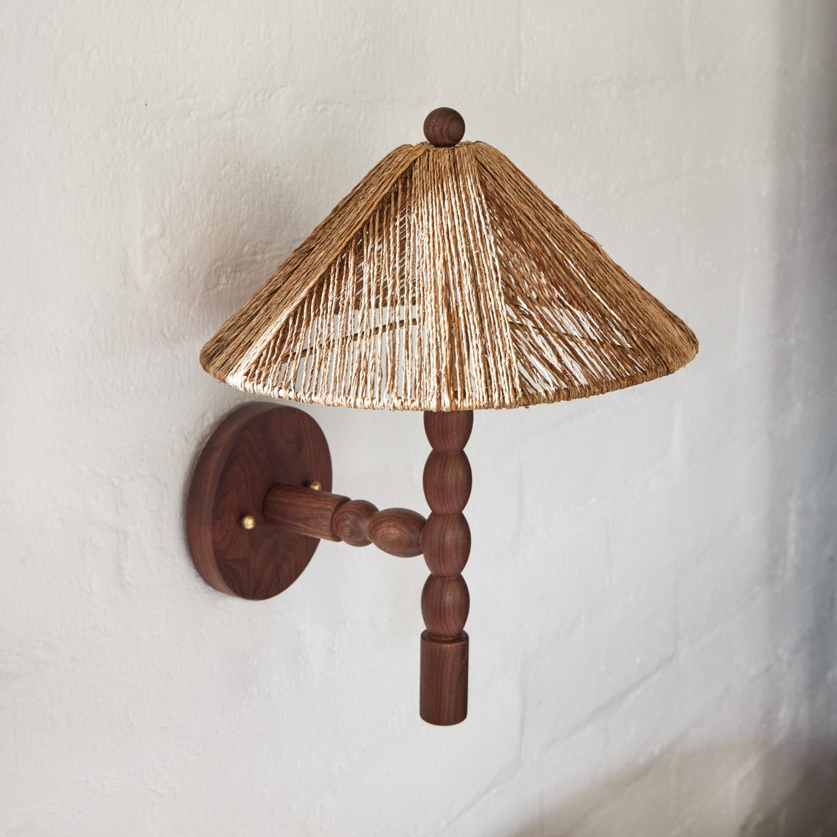 sconce on a white wall