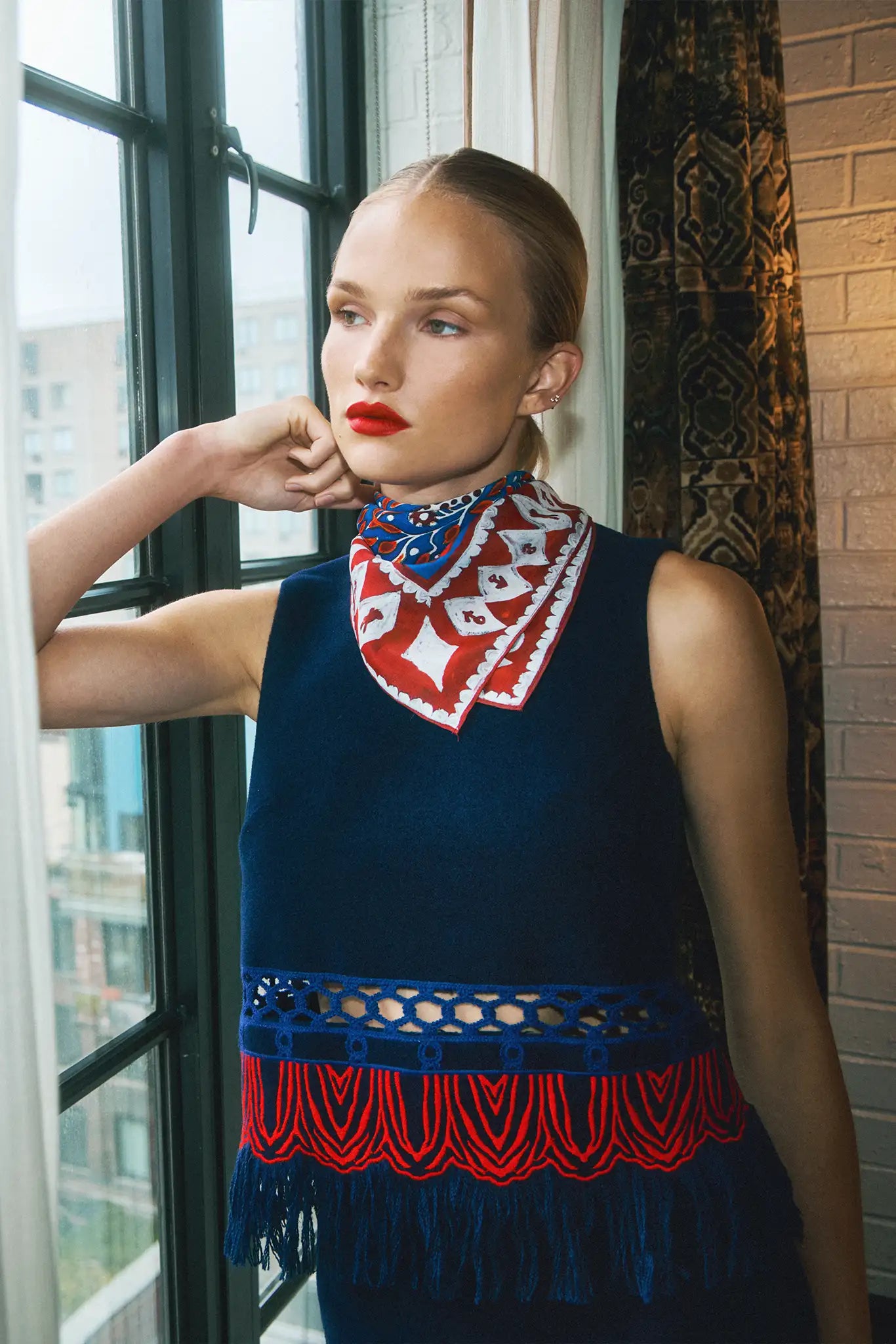 Double-sided printed scarf showcasing a whimsical winter tableau with a charming fawn at the center.