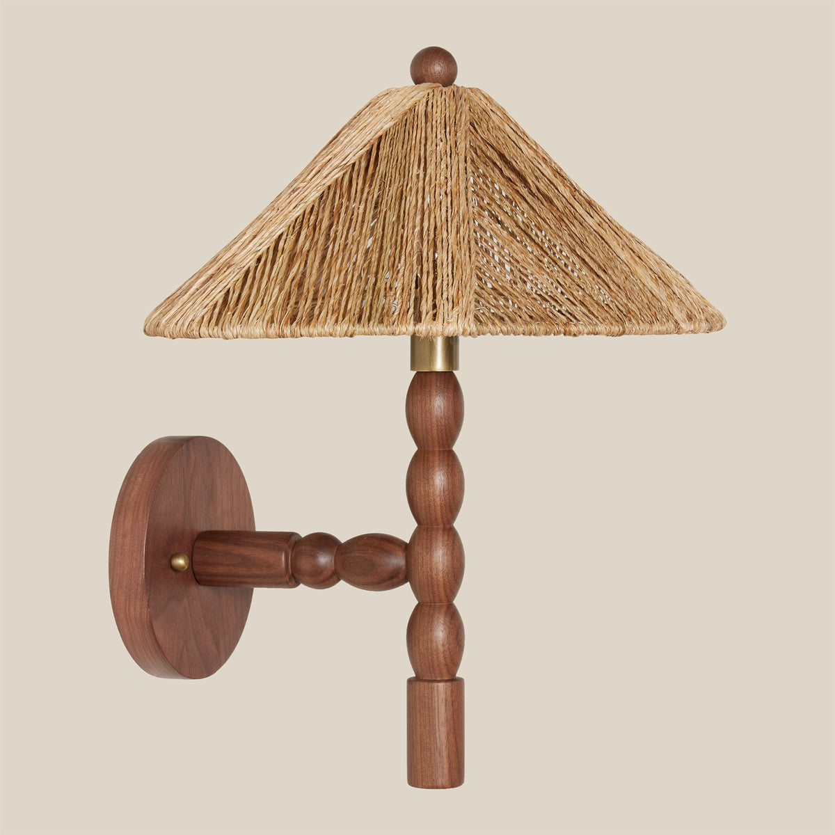 side angle of wood sconce with rattan shade