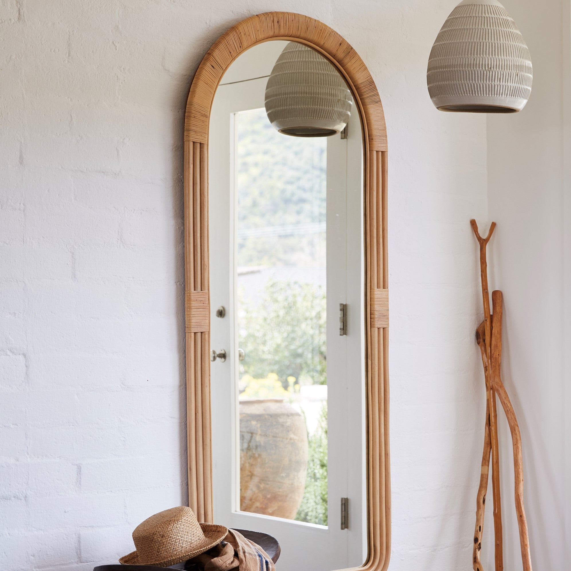 pelicano floor mirror in hallway