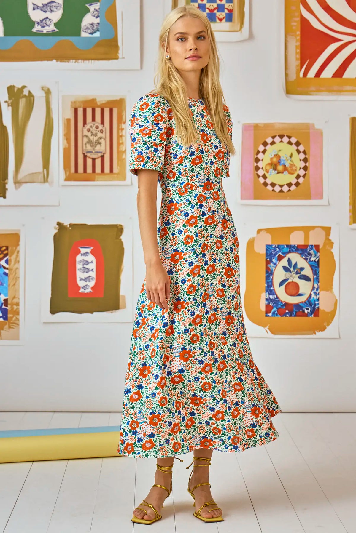 The Casey Dress is a sheath midi dress with a curved waist seam and a relaxed skirt.