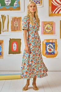 The Casey Dress is a sheath midi dress with a curved waist seam and a relaxed skirt.