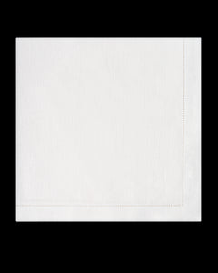 A white linen napkin with a hemstitch border