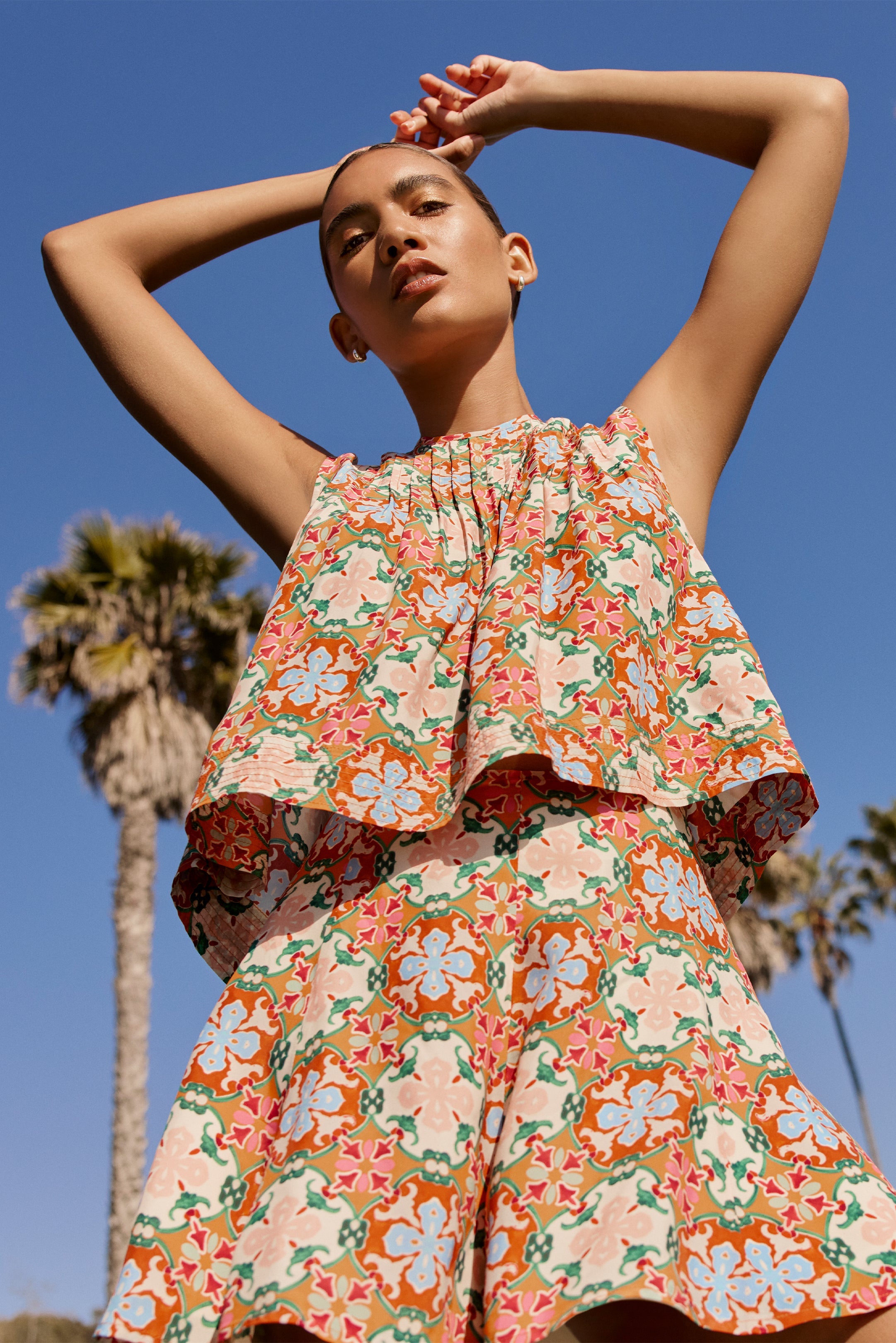 Sleeveless printed top with a relaxed fit and gathered neckline