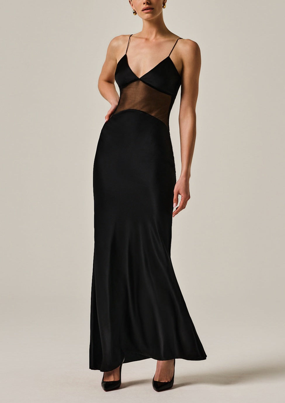 Silk stretch charmeuse maxi dress with sheer midriff. Dainty adjustable straps front view