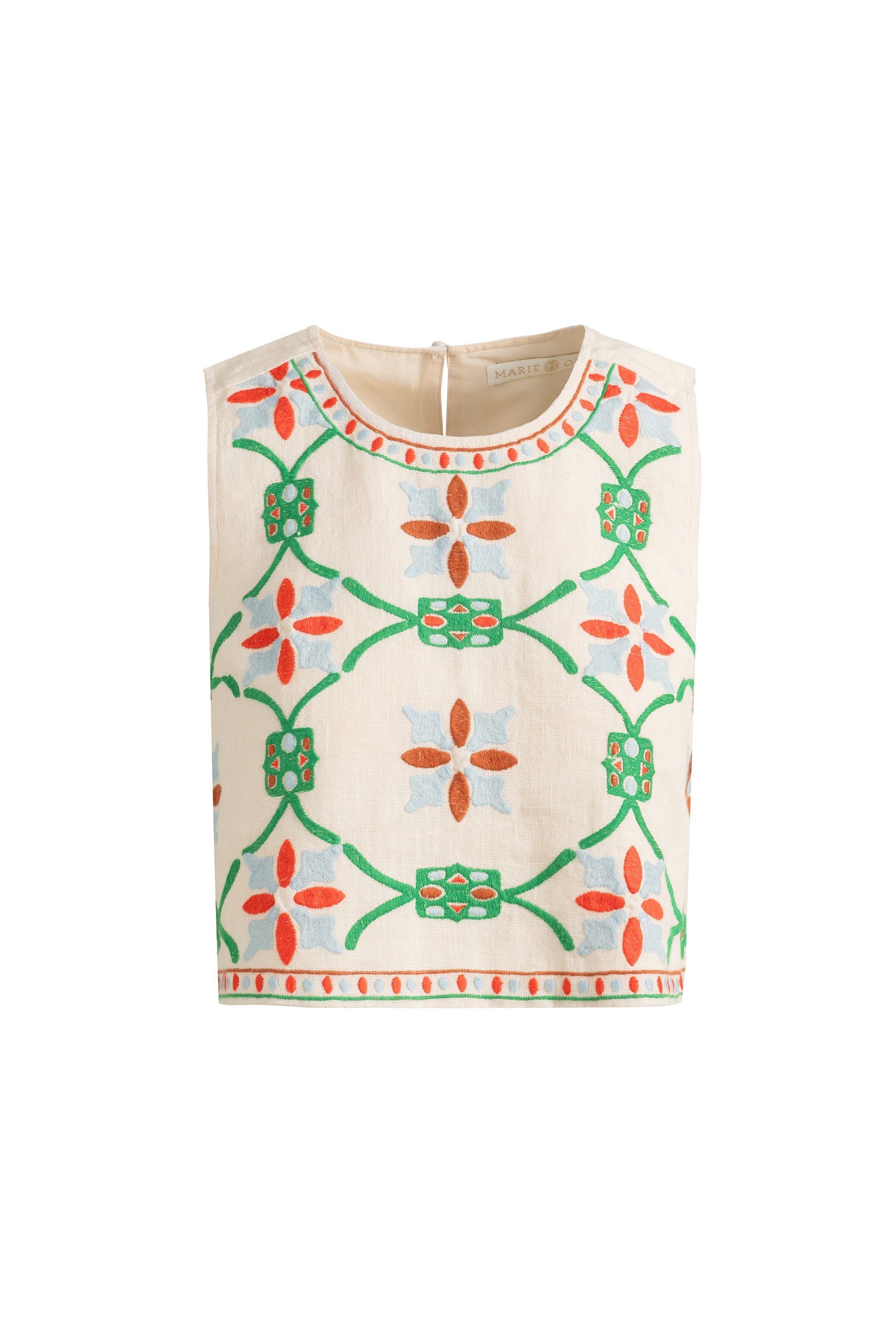 Cream top with vibrant stitched designs and clean lines