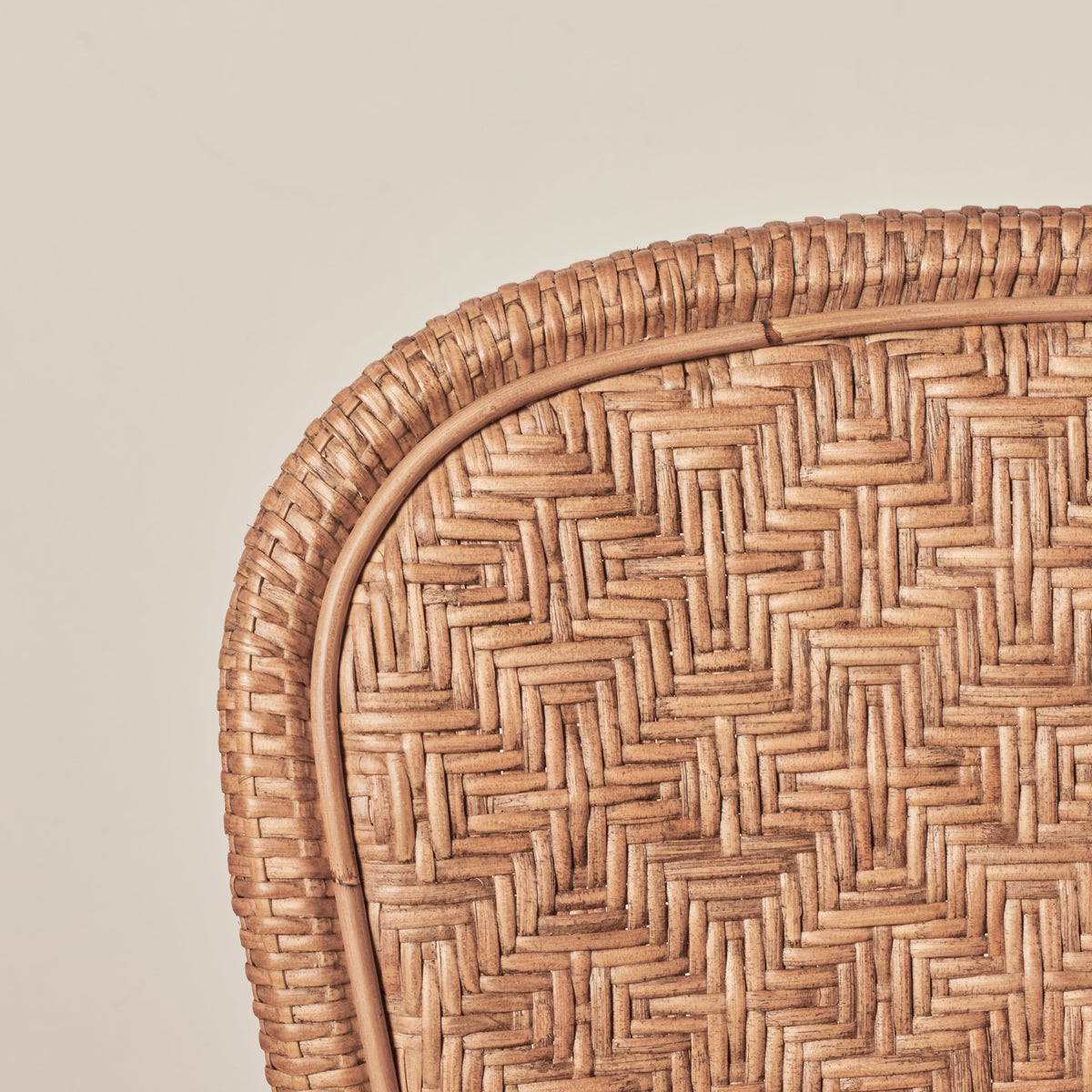 detail of backside of side chair in brown