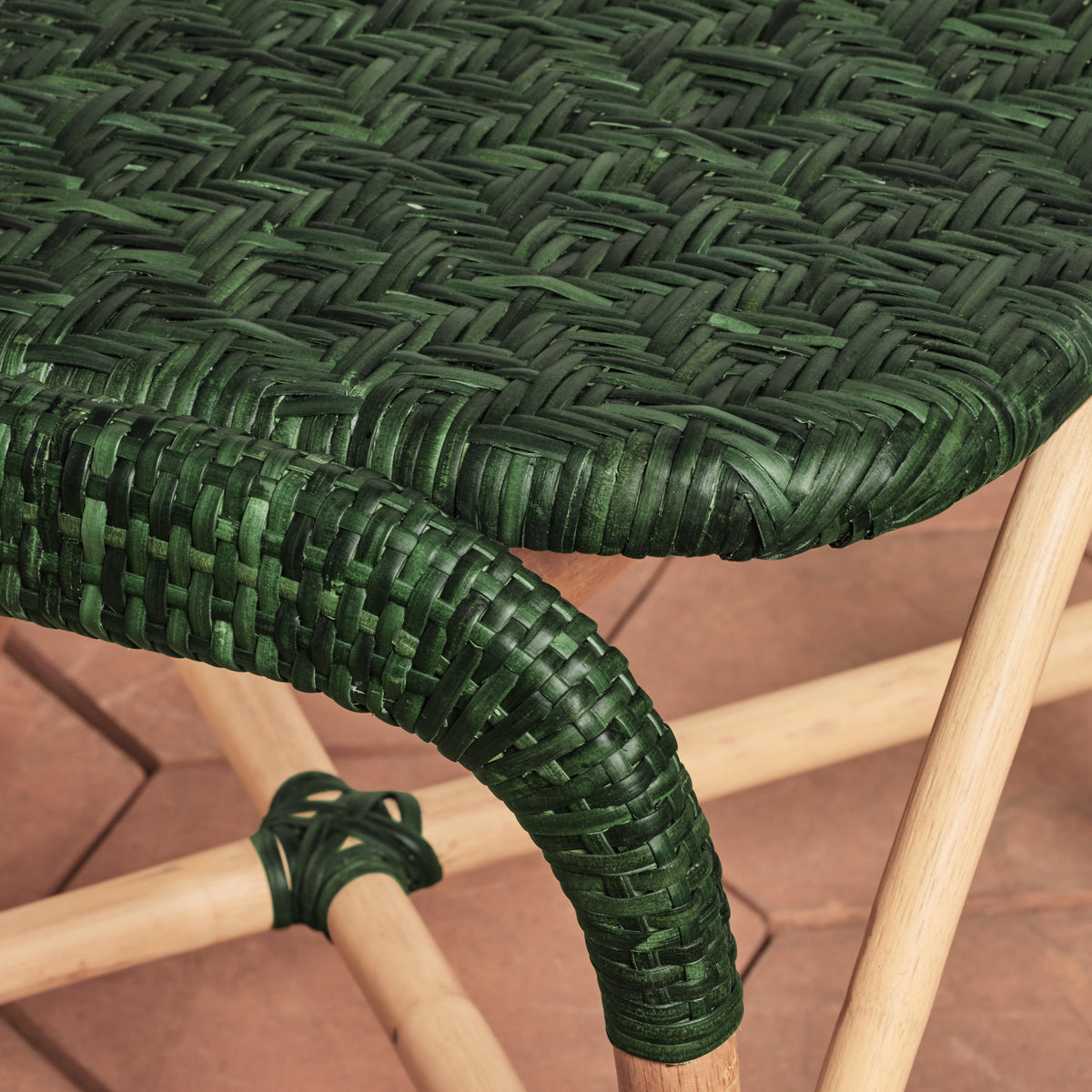 corner detail of green side chair