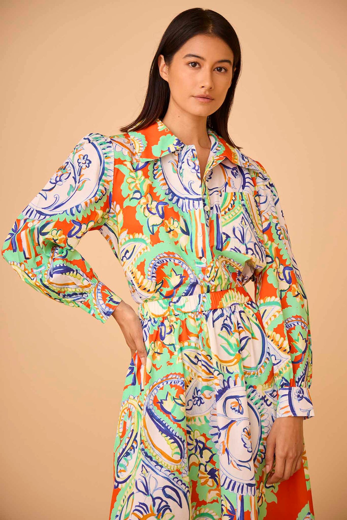 The Phoenix shirt has a collared neckline, pullover design and partial button-front placket.