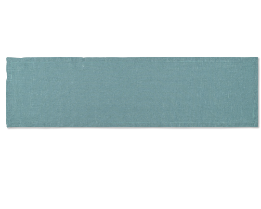 A linen table runner in the color marine