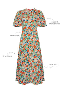 The Casey Dress is a sheath midi dress with a curved waist seam and a relaxed skirt.