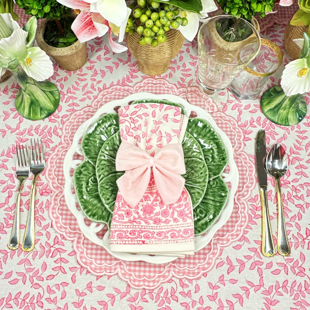 Pink bow napkin ties on Pink leaves tablecloth