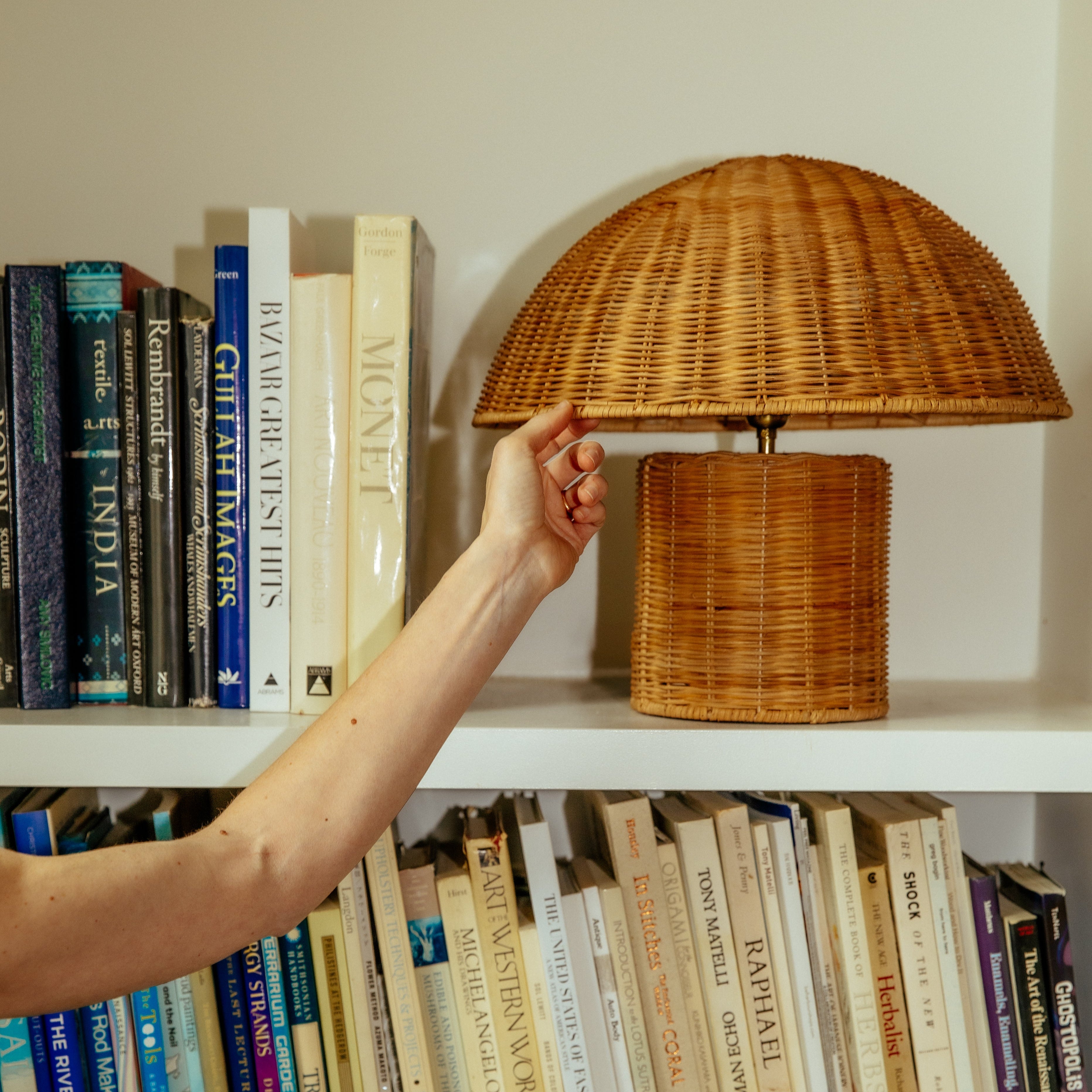 arm next to table lamp