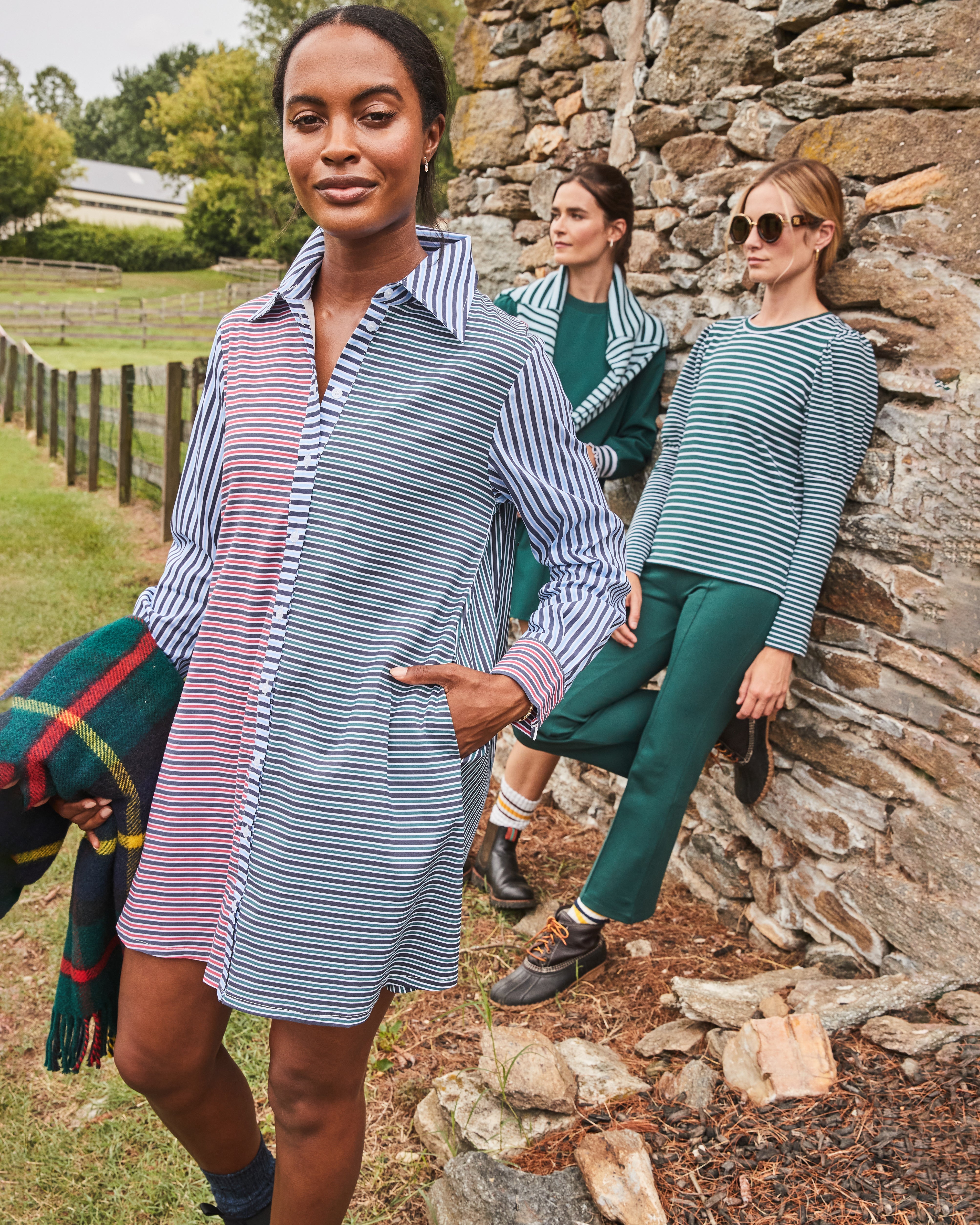 Model is wearing the Bloom Shirt Dress in Navy/ Cherry Stripe.