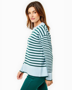 Model is wearing the Carlyle Crewneck in Baby Blue/ Ivy Stripe with the Court Skort in Super White/ Ivy/ Baby Blue Stripe