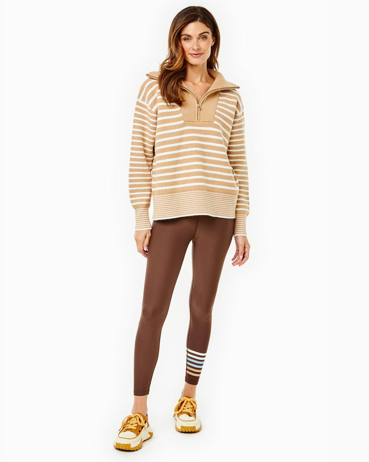 Model is wearing the Griffin Quarter Zip in Latte/ Off White Stripe with the Everyday Legging in Chocolate