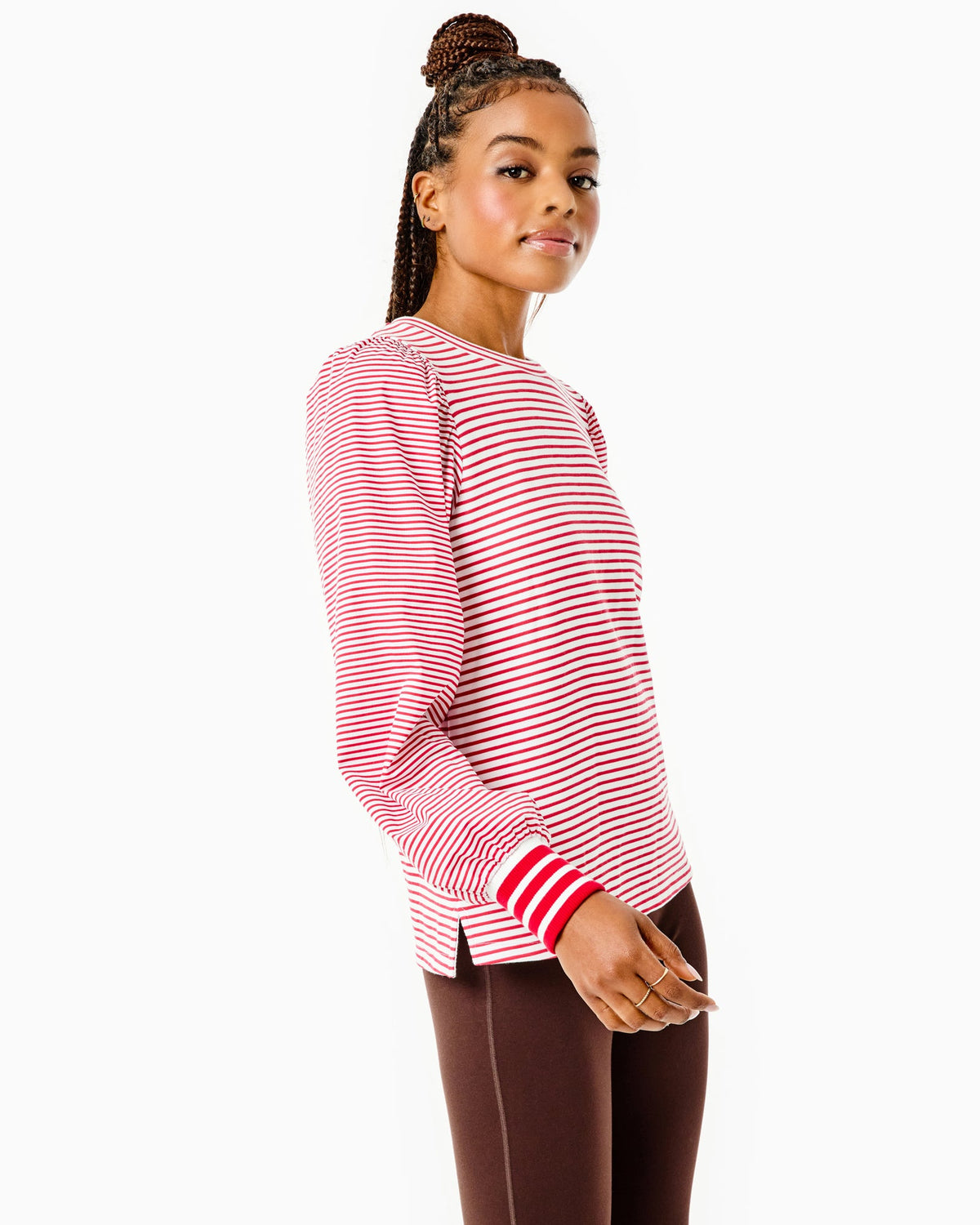 Model is wearing the Penny Pullover in Super White/ Cherry Stripes with the University Flare Pants in Chocolate