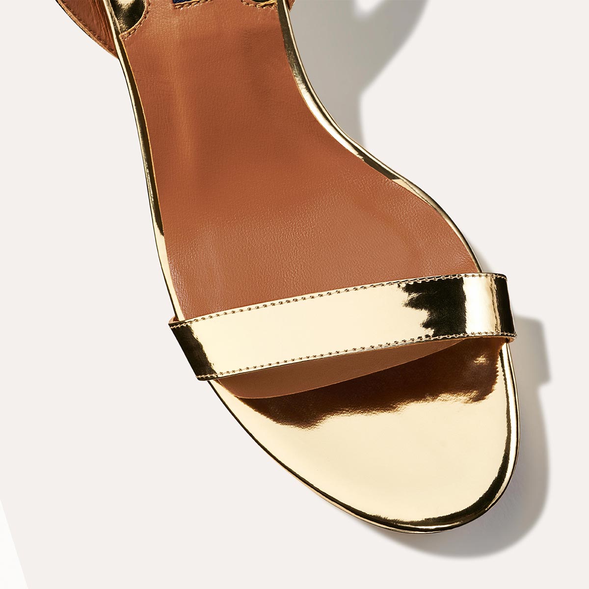 The Stella Platform in Gold Mirror