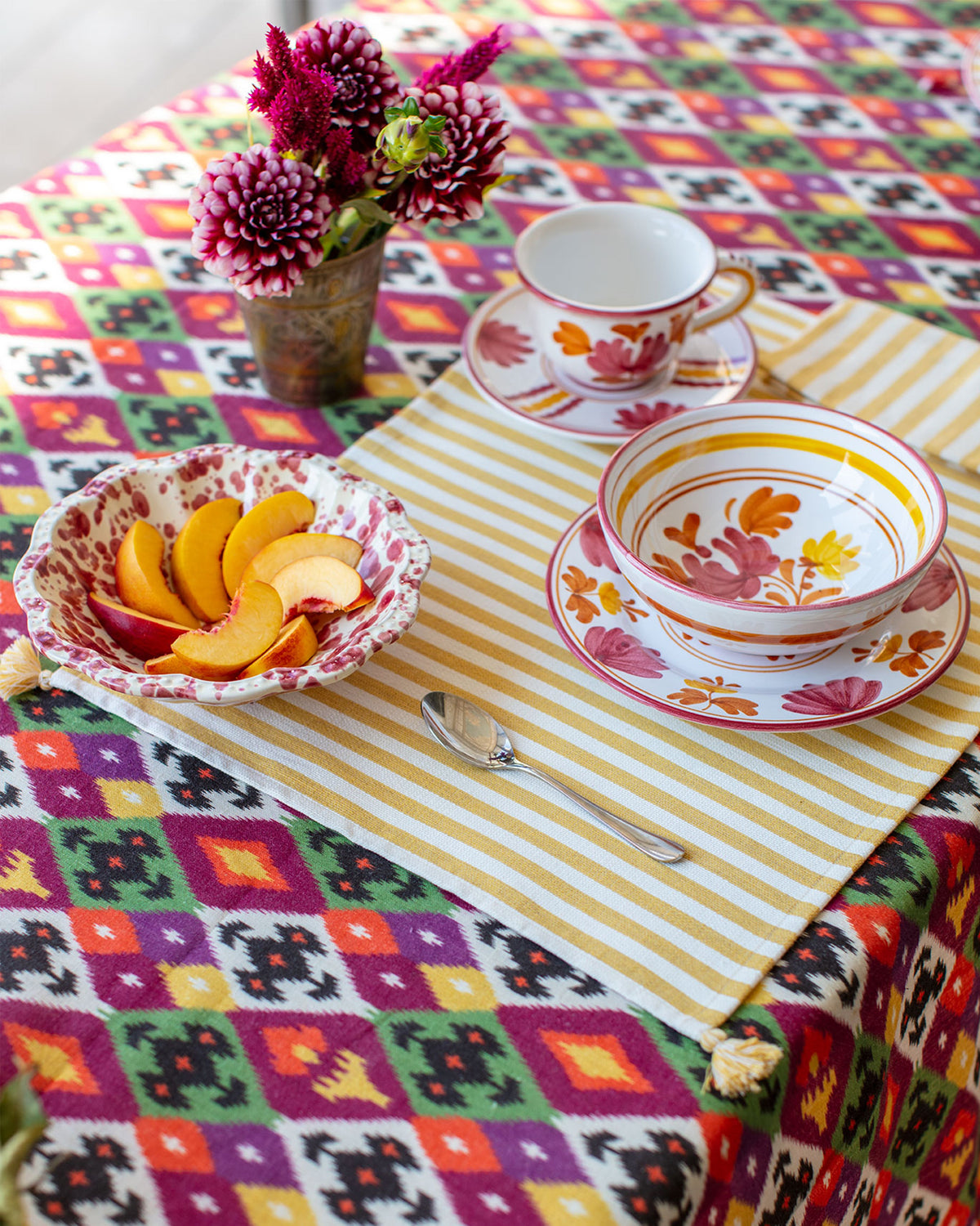 Blossom Teacup and Saucer in Burgundy