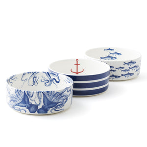 Coastal - School of Fish, Beach Towel Stripe and Lucy the Octopus medium pet bowls. Premium porcelain from Caskata.