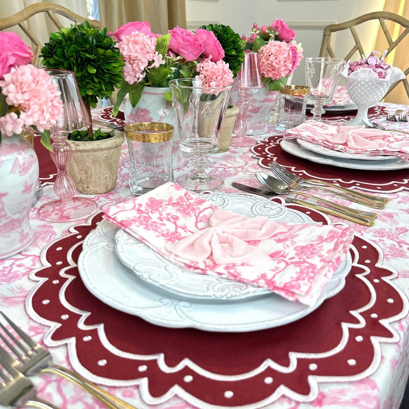 Pink toile tablecloth with wine placemats