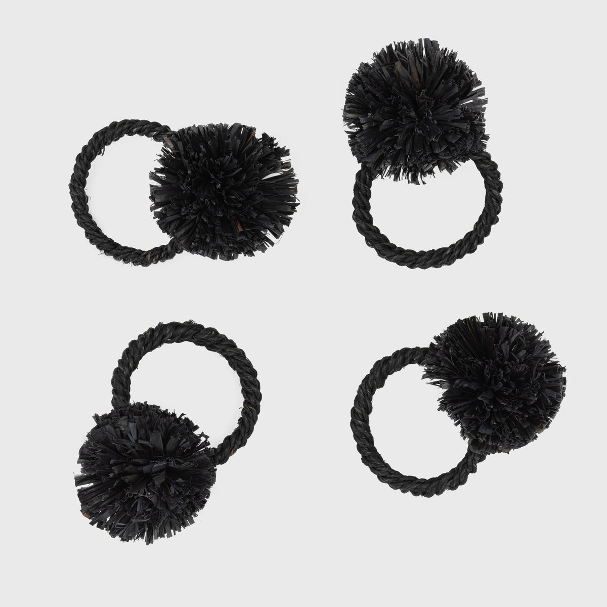 Straw Pompom Napkin Rings in Black, Set of Four