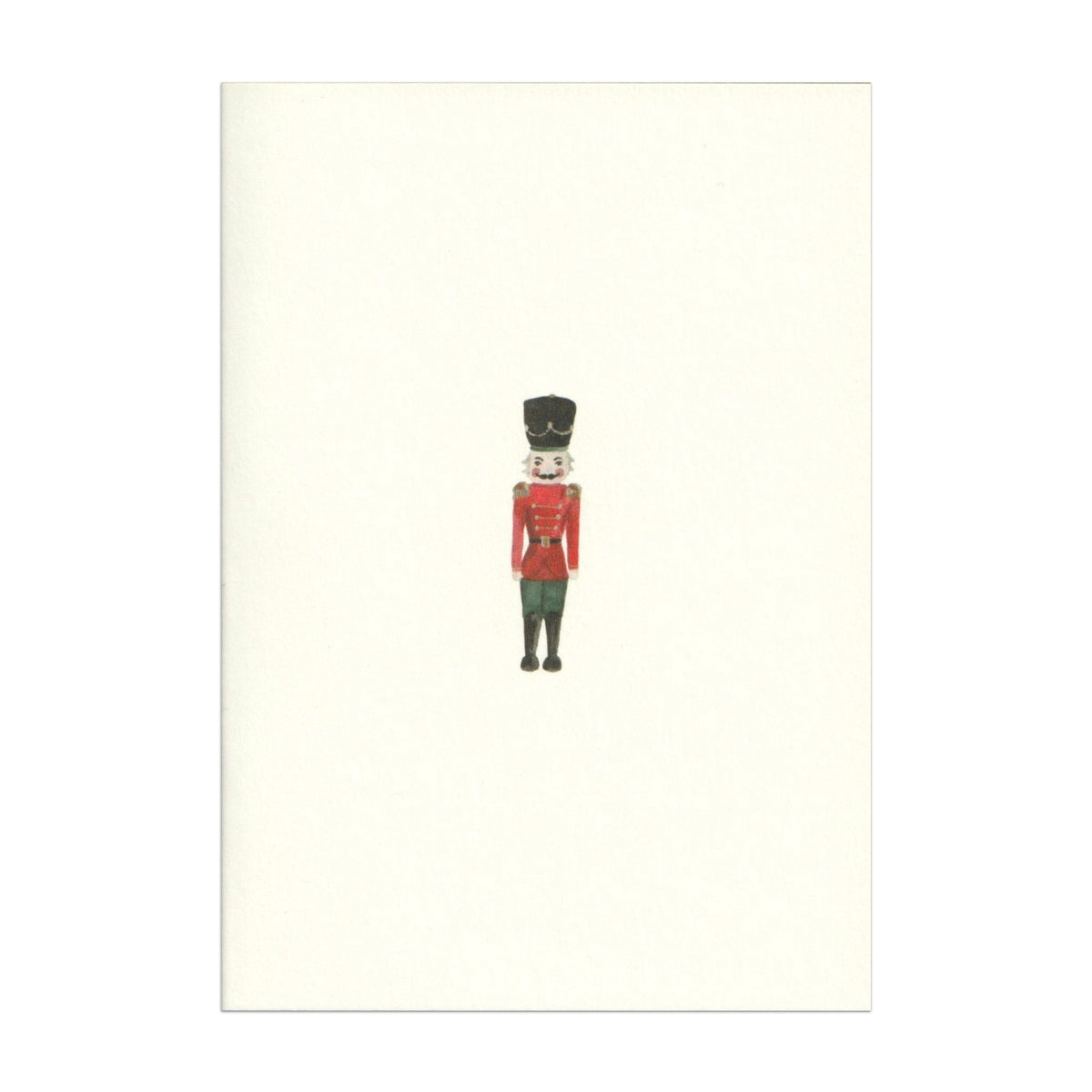 Luxury Christmas Card by Memo Press with a watercolour illustration of a Nutcracker solider and comes with a green envelope made in Britain