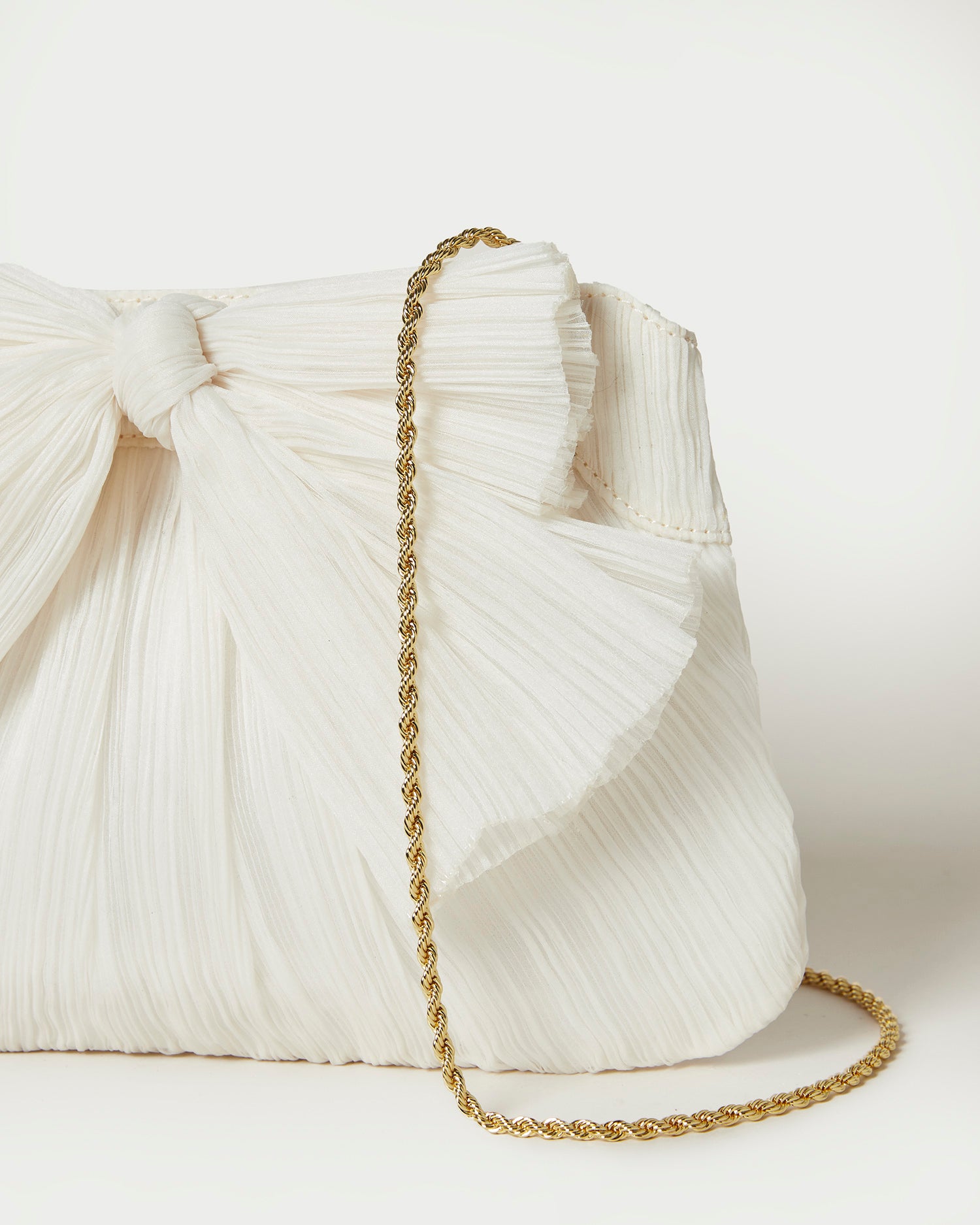 Rayne Bow Clutch in Pearl