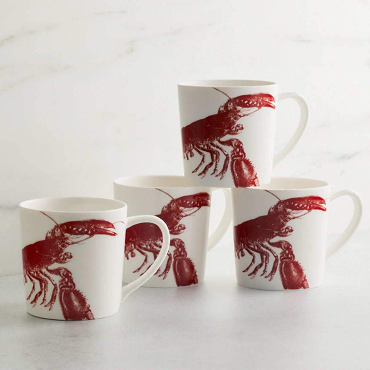 Four Caskata Artisanal Home Lobster Mug Reds perfect for serving chowda'.