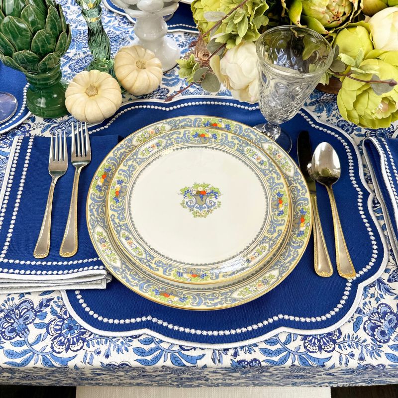 Charlotte luxury embroidery placemat in royal blue with matching napkin. 