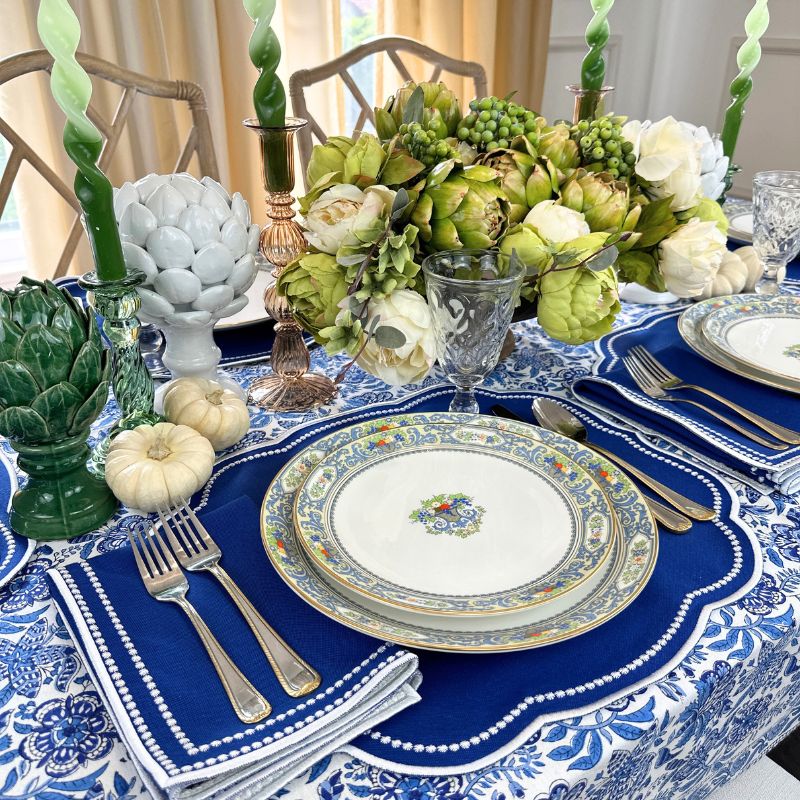 Charlotte luxury embroidery placemat in royal blue with matching napkin. 