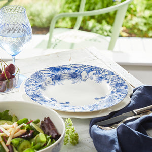 A spring table set with a Summer Blues Rimmed dinner plate.