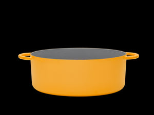 Enameled cast-iron Dutch oven in mustard yellow - side view no lid