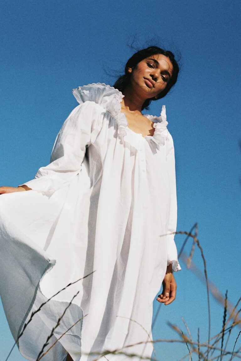 Woman wearing white cotton nightgown